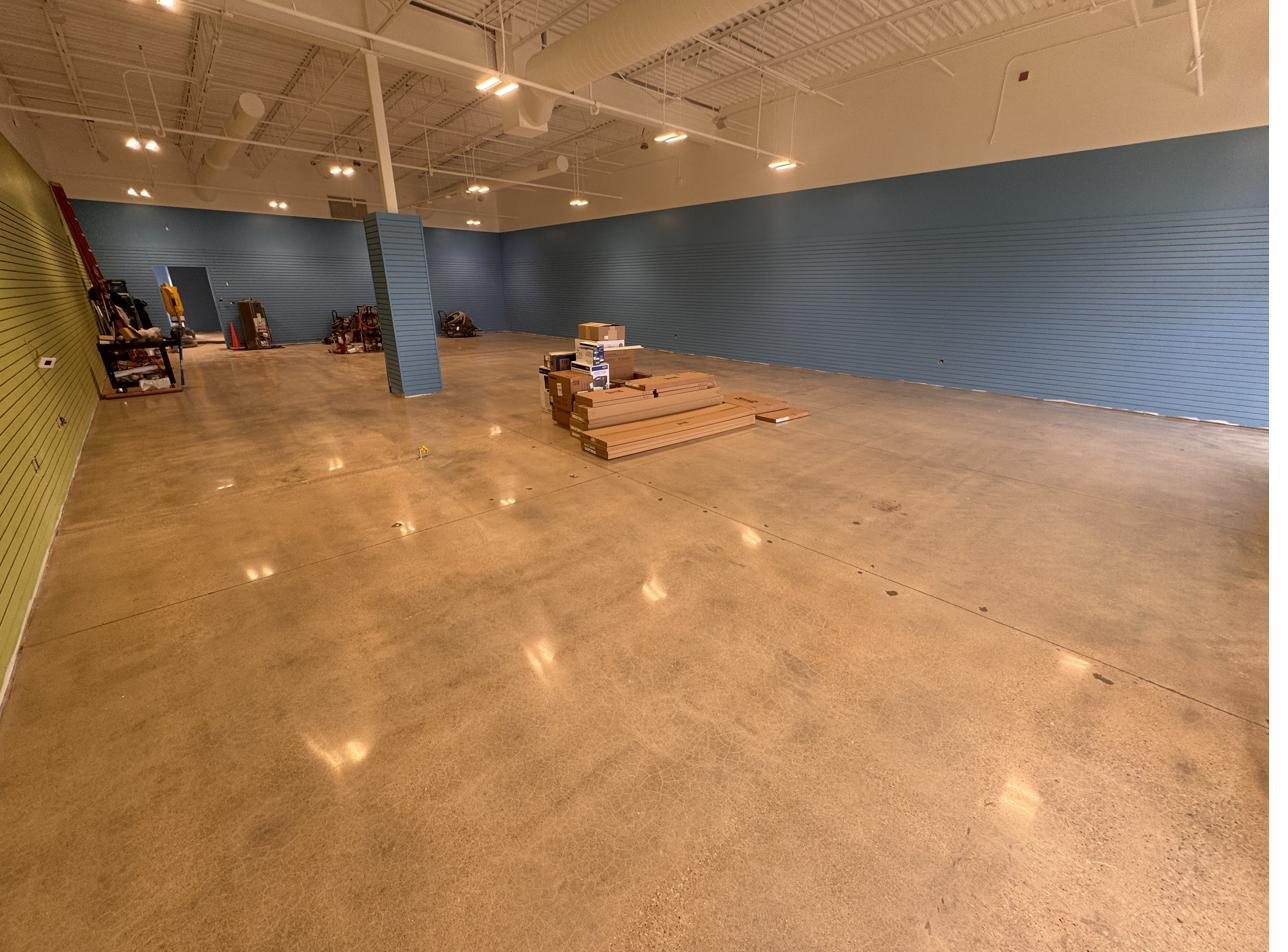 Polished concrete floor in a retail store buildout