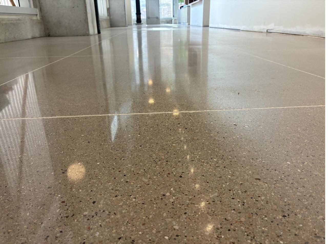 Close up of exposed aggregate polished concrete floor